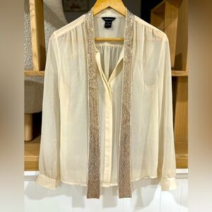 Cream blouse with sequin straps